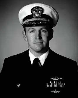 American Naval Officer Drucke: Commander Michael W. O'Neil, USN (covered). Country: Unknown