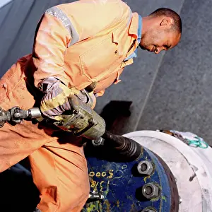 2004 Drucke: Bauarbeiter mit pneumatischem Bohrer.