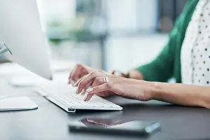 Professional Woman At Work Drucke: Hands, typing and keyboard with computer in office