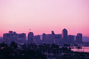 High Angle View Of A City Drucke: High Angle view of a cityscape at sunset