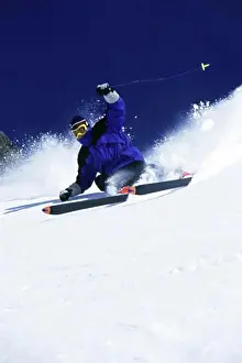 Powder Snow Drucke: Low angle view of a man skiing
