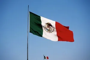 Mexican Flag Drucke: Low angle view of two Mexican flags