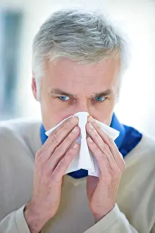Common Cold Remedy Drucke: Man blowing his nose