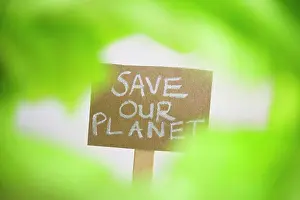 Drucke von Plakat mit der Aufschrift rettet unser Planet November Drucke: Plakat mit der Aufschrift rette unseren Planeten.