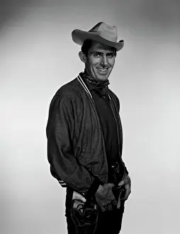 Mid Adult Men Portraits Drucke: Studio portrait of cowboy