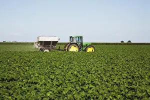 Agricultural Equipment Images Drucke: Tractor-Pulled Bulk Fertilizer Application Broadcasting Urea Fertilizer (Source Of Nitrogen)