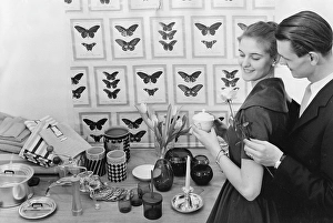 Young Adults In Love Drucke: In the 1950s. A young with the typical 1950s designed objects