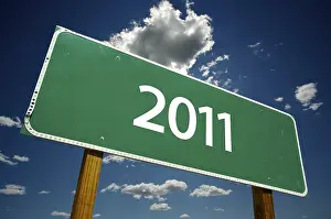 Symbolic New Year Image Drucke: 2011 road sign with dramatic clouds and sky