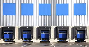 Freight Service Germany Drucke: 5 blue loading ramps at warehouse
