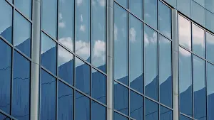 Abstract background reflected in the glass windows of the building