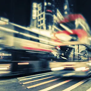 Illuminated Skyscrapers Drucke: Abstract cityscape blurred background