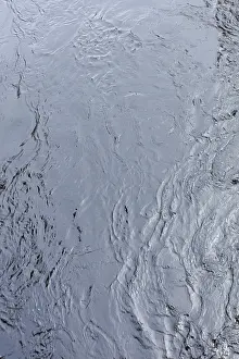 Northern Europe Water Surface Drucke: Abstract flowing river water surface pattern