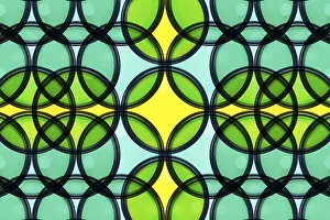 Abstract Geometric Pattern Drucke: Abstract geometric pattern with overlapping translucent green and yellow circles creating a modern