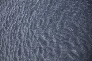 Scandinavian Waterfront Scene Drucke: Abstract water surface with ripples and waves as background