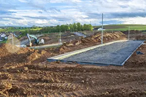 Newly Constructed Buildings Drucke: Access roads are being built on a construction site in a new development area