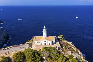 Rocky Shoreline Photography Drucke: Aerial view, Lighthouse Far de Capdepera with cliffs