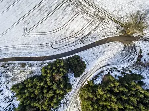 Schweiz Drucke: Luftbild von schneebedeckten Feldern.