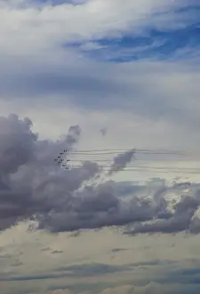 Aerial Display Drucke: Aerobatic jets soar through a dramatic
