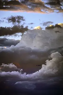Passenger Plane Photography Drucke: Airplane in front of a cloud