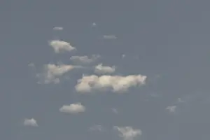 European Weather Forecast Drucke: Altocumulus white clouds in a blue sky