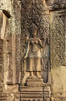 Siem Reap Drucke: Alte Basreliefs an der Wand eines Tempels.