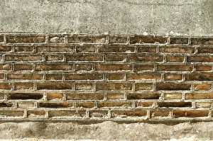 Abandoned Brick Architecture Drucke: Ancient Brick Wall. River dike