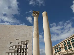 Deserted Building Europe Drucke: Two ancient columns in front of a building