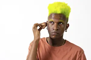 LGTBI Concept Image Drucke: An androgynous black man posing putting on makeup