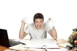 Young Male Model Drucke: Angry Student with rumpled papers in his hands
