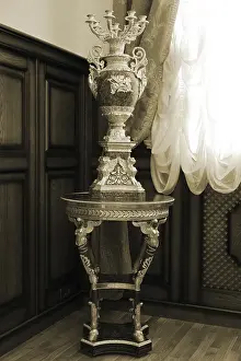 Sepia Toned Image Drucke: Antique candlestick standing by the window