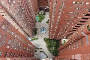 Deserted Cityscape At Night Drucke: An apartment tower complex seen from the top