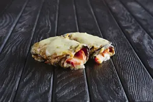 Gourmet Reception Food Drucke: Appetizer for reception. Eggplant stuffed with bacon