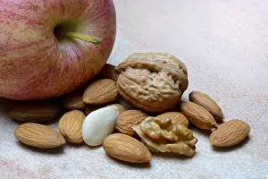 Empty Table Setting For Food Photography Drucke: Apple and various nuts, walnuts and almonds