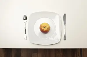Healthy Eating Nutrition Drucke: Apple on a white plate