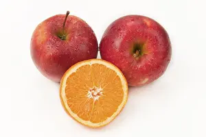 Balanced Diet Stock Photos Drucke: Two apples and one orange slice