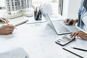 Construction Plan Blueprint Drucke: Architect working on the desk, construction project ideas architecture engineer Concept