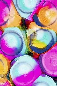Colorful Design Drucke: An array of vibrant, abstract ink patterns featuring a mixture of bright pink