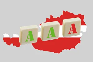 Drucke von Drei A's auf einer Karte Österreichs, eine ist rot als Symbol für das Risiko der Triple-A-Bewertung zu verlieren Karte Drucke: Drei A's auf einer Karte Österreichs.