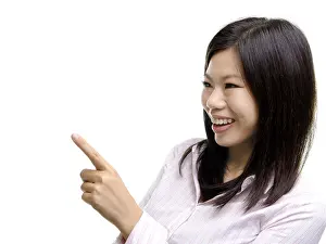 Bright Background Photo Drucke: Asian pointing to empty space, ready for text