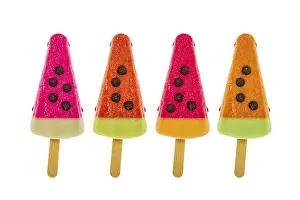 Studio Shot Dessert Drucke: Four assorted fruit popsicles isolated on a white background