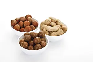 Still Life Images Drucke: Assorted nuts in ceramic bowls