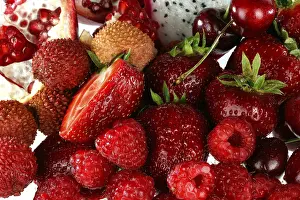 Indoor Plant Photography Drucke: Assorted red fruit on white background