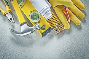 Construction Tools Drucke: Assortment of construction tools on concrete background building concept