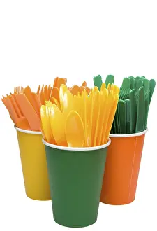 Uninhabited Dining Area Drucke: An assortment of Plastic Silverware in paper cups