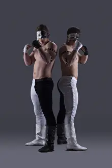 Black And White Studio Photography Drucke: Two attractive men in masks posing in studio