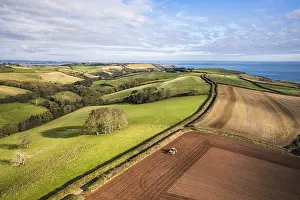 Autumn In Devon Drucke: Autumn over Devon fields and farms from a drone