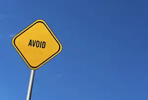 Deserted Landscape Photo Drucke: Avoid, yellow sign with blue sky