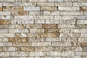 Uninhabited Stone Structure Drucke: Background consisting of a wall of beige and brown clinker bricks