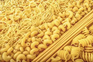 Diverse Noodle Dishes Drucke: Background of different types of raw pasta close up