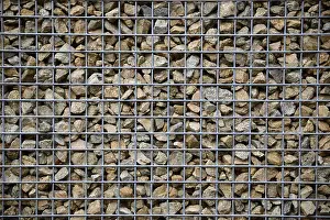 Deserted Metal Structure Drucke: Background of rocks and steel mesh